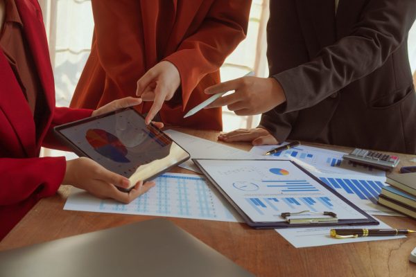 Indoor business meeting in a modern office. Confident businesswo seo audit