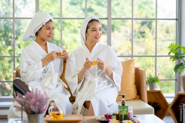 two-asian-pretty-women-hold-cup-of-tea-and-look-to-2026-01-08-22-49-21-utc beauty